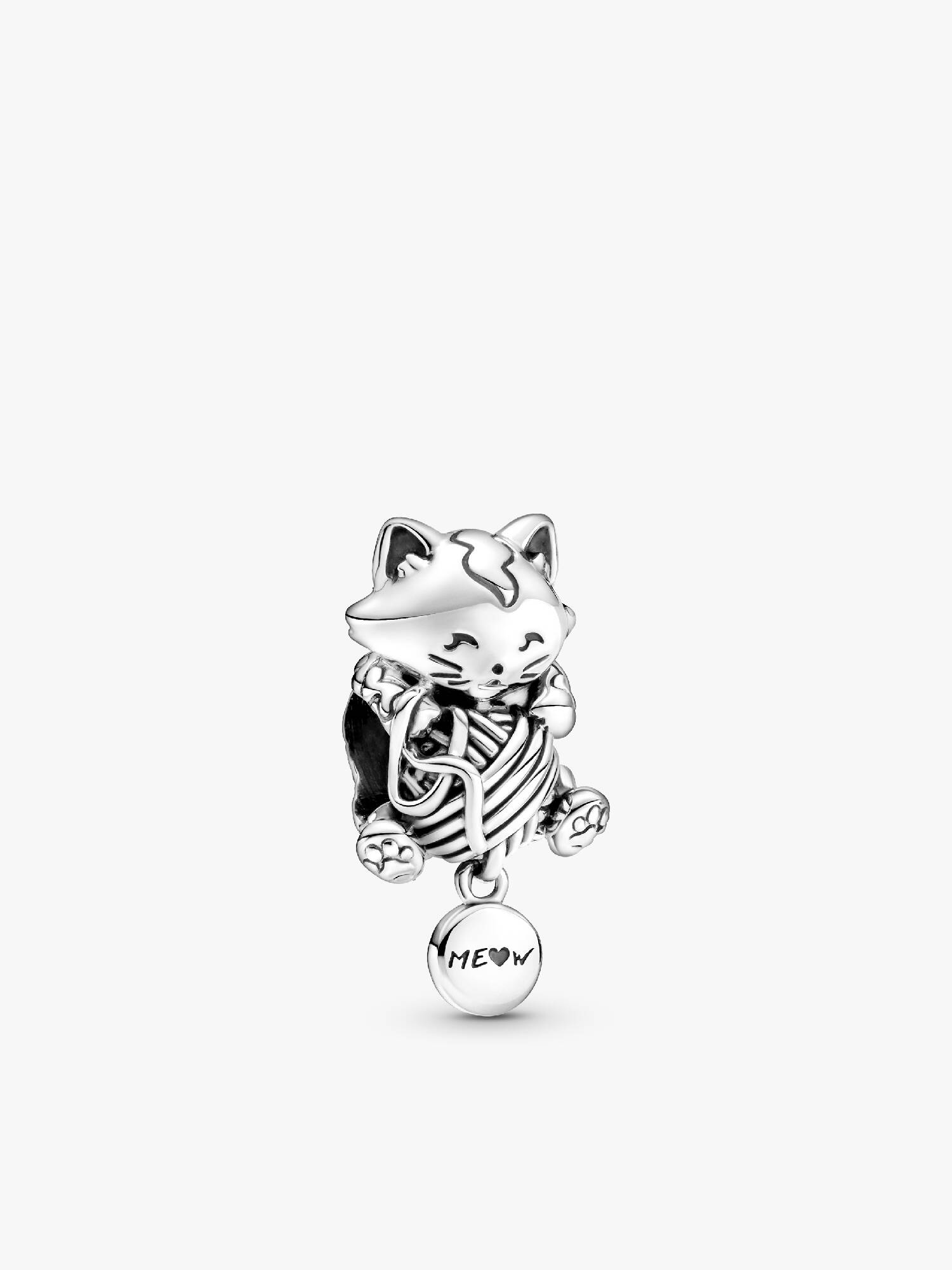 Σύμβολο με γατάκι και κουβάρι μαλλί